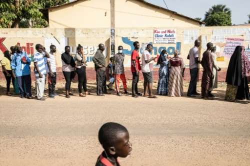 Turnout was high in Saturday's election, with people queueing for hours to vote.  By JOHN WESSELS (AFP/File)