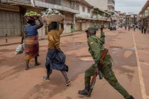 Uganda's army apologised for a 'high-handed' response after security forces violently cleared the streets in Kampala. By Badru KATUMBA (AFP/File)