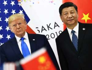 US President Donald Trump and China's Xi Jinping -- seen here in June 2019 -- started to redefine one of the world's most significant geopolitical relationships in the 2010s. By Brendan Smialowski (AFP/File)