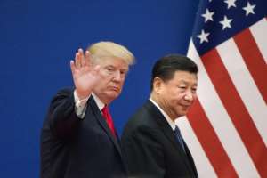 US President Donald Trump (L, pictured November 2018) said he did not expect to meet his Chinese counterpart Xi Jinping before March 1, leading to a slump in world stock markets.  By Nicolas ASFOURI (AFP/File)