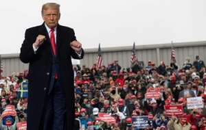 US President Donald Trump, seen here at a rally in Pennsylvania on Monday, claimed the US was 'rounding the corner'.. By SAUL LOEB (AFP)