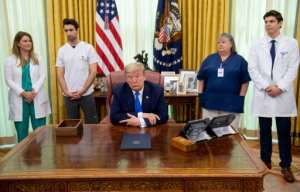 US President Donald Trump speaks about COVID-19 in the Oval Office of the White House. By SAUL LOEB (AFP)