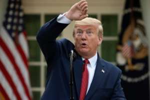 US President Donald Trump warned that the virus crisis would continue to get worse for some time. By JIM WATSON (AFP)