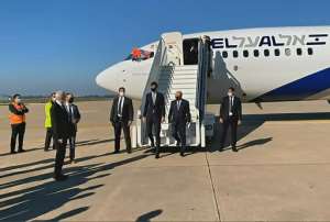 US President Donald Trump's son-in-law and advisor Jared Kushner (L) and Israeli National Security Advisor Meir Ben Shabbat leave the plane in Rabat. By - (US EMBASSY IN MOROCCO/AFP)