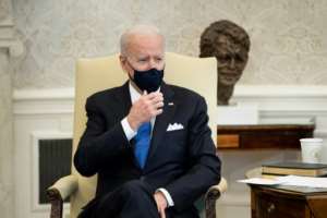 US President Joe Biden wants Americans to keep wearing masks as much as possible. By Brendan Smialowski (AFP)