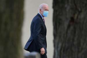 US President-elect Joe Biden has vowed to step up efforts to end the pandemic and will sign executive orders on the day he is inaugurated next week. By Angela Weiss (AFP/File)