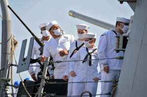 US sailors stand aboard the USS Winston S. Churchill while it anchors in Port Sudan. By - (AFP)