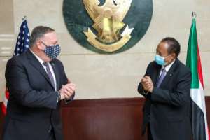 US Secretary of State Mike Pompeo greets Sudanese Prime Minister Abdalla Hamdok in Khartoum in August 2020 as Washington encouraged Sudan to recognize Israel. By - (Office of Sudan's Prime Minister/AFP/File)