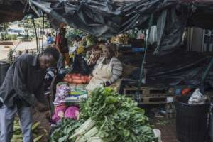 Veggies: A market in the Johannesburg suburb of Soweto. By MARCO LONGARI (AFP)