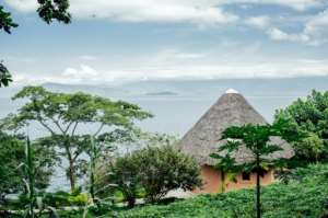 Visitors to Henkinbrant's precinct on Idjwi Island stay in thatched-roof bungalows with mountain and lake views. By Luke DENNISON (AFP)