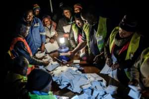 Vote counting went into the night in the suburb of Mbare in Zimbabwe's capital Harare. By Luis TATO (AFP)