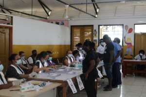 Voters and electoral commission agents wear face masks -- although the archipelago has recorded just 149 mostly imported cases the coronavirus has hammered the tourist industry. By Rassin VANNIER (AFP)