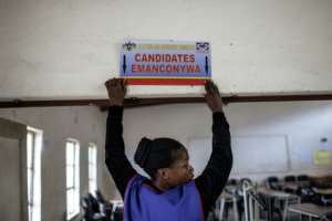 Voting booths were set up in schools and community halls across the largely rural country a day before the election.  By GIANLUIGI GUERCIA (AFP)