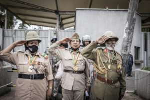 War veterans salute at a rally outside the British embassy in Addis on Thursday. The demonstration was against purported fake news and foreign meddling. By Amanuel Sileshi (AFP)