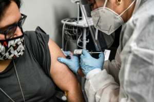 Washington said it would distribute any vaccine proven to be effective to all Americans for free. By CHANDAN KHANNA (AFP)