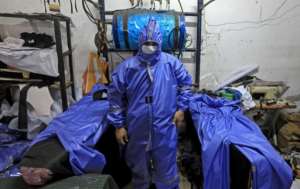 WHO has warned dwindling supplies of personal protective equipment (PPE) for frontline workers will put lives at risk. By MAHMUD HAMS (AFP)