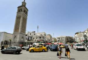 While Tunisia is in political turmoil, ordinary life in the capital Tunis appears to be much same as normal. By FETHI BELAID (AFP)