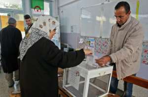 While only a trickle of voters cast their ballots in some districts, Algerian national television showed longer queues elsewhere. By STRINGER (AFP)