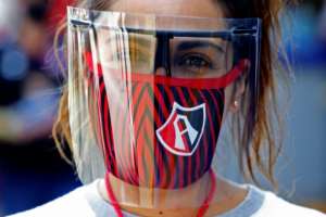 With no vaccine yet, measures such as face masks are among the few options available in the fight against the coronavirus. By Ulises Ruiz (AFP)