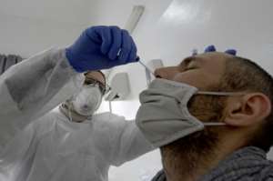 With novel coronavirus cases surging, over 50 deaths a day, and many hospitals reaching capacity, authorities imposed a four-day lockdown from Thursday. By FETHI BELAID (AFP/File)