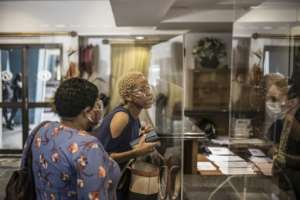 With prices lower as international travellers stay away, South Africans who would not have been able to afford the trip are trying out the Blue Train. By MARCO LONGARI (AFP)