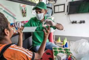 With the financial crunch caused by the COVID-19 pandemic, some charities have concentrated efforts on health and sanitation to help children protect themselves against the disease. By Khaled DESOUKI (AFP)