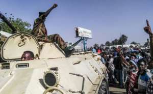Witnesses said troops had stationed several vehicles loaded with machine-guns at the gates of the complex. By - (AFP)