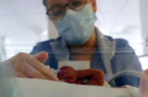 Women who receive care by professional midwives are 16 percent less likely to lose their baby and 24 percent less likely to experience pre-term birth, according to the WHO. By HANNAH MCKAY (POOL/AFP/File)