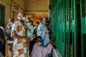 Worshippers cannot enter the mosque without a mask. By CARMEN ABD ALI (AFP)