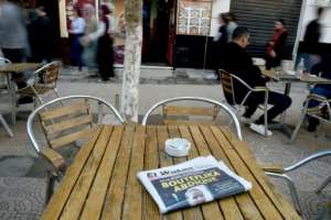 Yesterday's news -- the front page of a newspaper, the day after Bouteflika's fall. By RYAD KRAMDI (AFP/File)