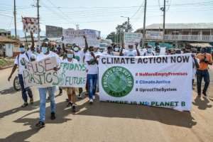 Youth activists protest for action on climate change in September 2021 in Kisumu, western Kenya. By Brian Ongoro (AFP/File)