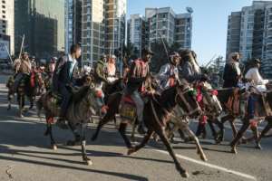 Young men from Ethiopia's Oromo ethnic group turned out to meet Abiy. By EDUARDO SOTERAS (AFP)
