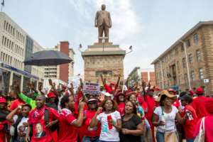 Zimbabwe opposition supporters gather a National Electoral Reform (NERA) coalition march through Bulawayo, on September 17, 2016