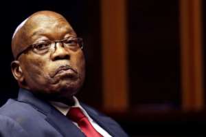 Zuma, ministers, senior officials and the wealthy Indian-born Gupta brothers -- accused of bribing their way into government contracts -- all feature in the 400-page novel under different names. By Themba Hadebe (POOL/AFP/File)