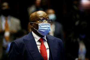 Zuma, pictured in May at his corruption trial in Pietermaritzburg. He faces 16 charges relating to the 1999 purchase of fighter jets, patrol boats and military gear. By PHILL MAGAKOE (POOL/AFP)