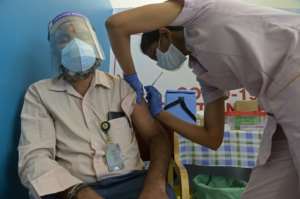 A man is vaccinated in Hyderabad, India. By Noah SEELAM (AFP)