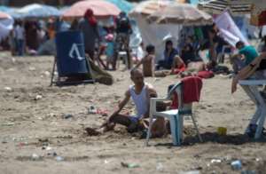 A man sits on the beach in Rabat on July 12, 2018. By FADEL SENNA (AFP)