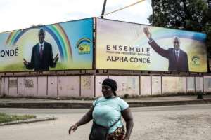 A massive Conde billboard in capital Conakry. By JOHN WESSELS (AFP)