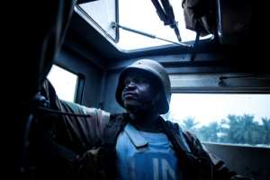 A member of MONUSCO, the UN's largest peacekeeping force, in the DRC town of Oicha. By JOHN WESSELS (AFP)