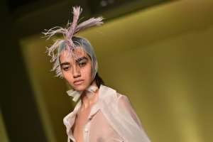 A model presents a creation by Nigerian fashion stylist Joy Ijeoma Meribe from the collective