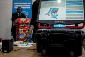 A number of touch-screen voting terminals were damaged in the fire at a large election commission warehouse in Kinshasa.  By John WESSELS (AFP/File)