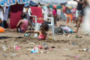 A child plays on the beach in Rabat on July 12, 2018. By FADEL SENNA (AFP)