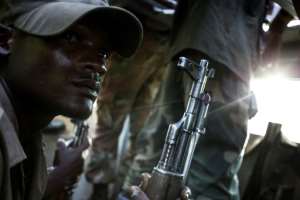 A Congolese soldier on patrol for members of the ADF. By JOHN WESSELS (AFP)