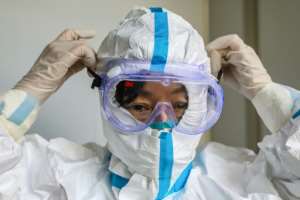 A doctor prepares to enter the isolation ward at a hospital in Wuhan, epicentre of the virus outbreak. By STR (AFP)