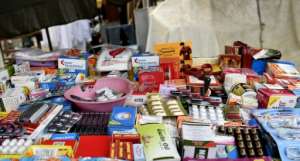 A drugs stall on a street in Lagos. Informal sales outlets are a major channel for counterfeit medicine. By PIUS UTOMI EKPEI (AFP)