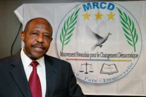 A file picture from June 18, 2019, showing Rusesabagina speaking at an press conference in Brussels. By NICOLAS MAETERLINCK (BELGA/AFP/File)