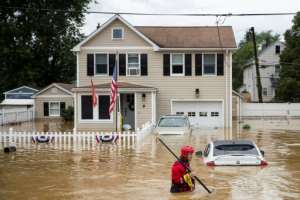 A flash flood caused by Tropical Storm Henri makes landfall, in Helmetta, New Jersey in August 2021. By Tom Brenner (AFP/File)