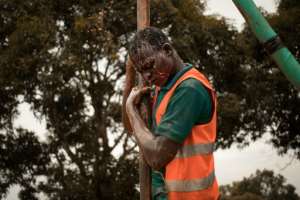 A former child soldier works on drilling a borehole in Bangui, part of a vocational programme for young victims of the Central African Republic's long conflict. By FLORENT VERGNES (AFP)