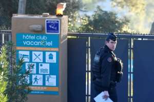 A French gendarme walks at the entrance of a holiday resort near Marseille, France, where French citizens evacuated from Wuhan, China, are expected to be put under quarantine for 14 days. By GERARD JULIEN (AFP)