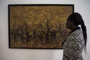 A painting Ablade Glover at the Dei Centre art gallery, which showcases around 30 pieces from different Ghanaian artists.  By CRISTINA ALDEHUELA (AFP)